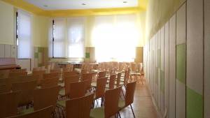 Room acoustics solution for the ballroom of the youth school Waldhaus in Malsch